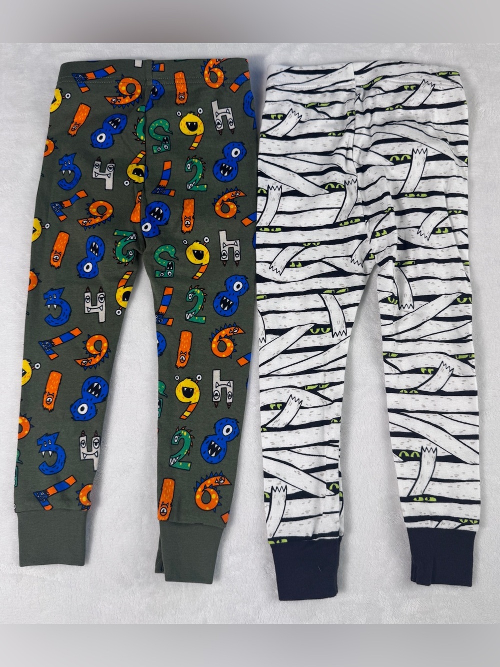 Old Navy Kids Pajama Bottoms - Olive Green Number Monsters & White Mummy Stripe